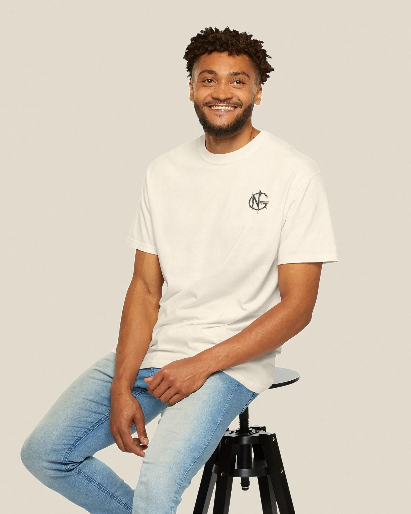 No Guidance Lost on Purpose tee in ivory worn with the NG chest mark visible
