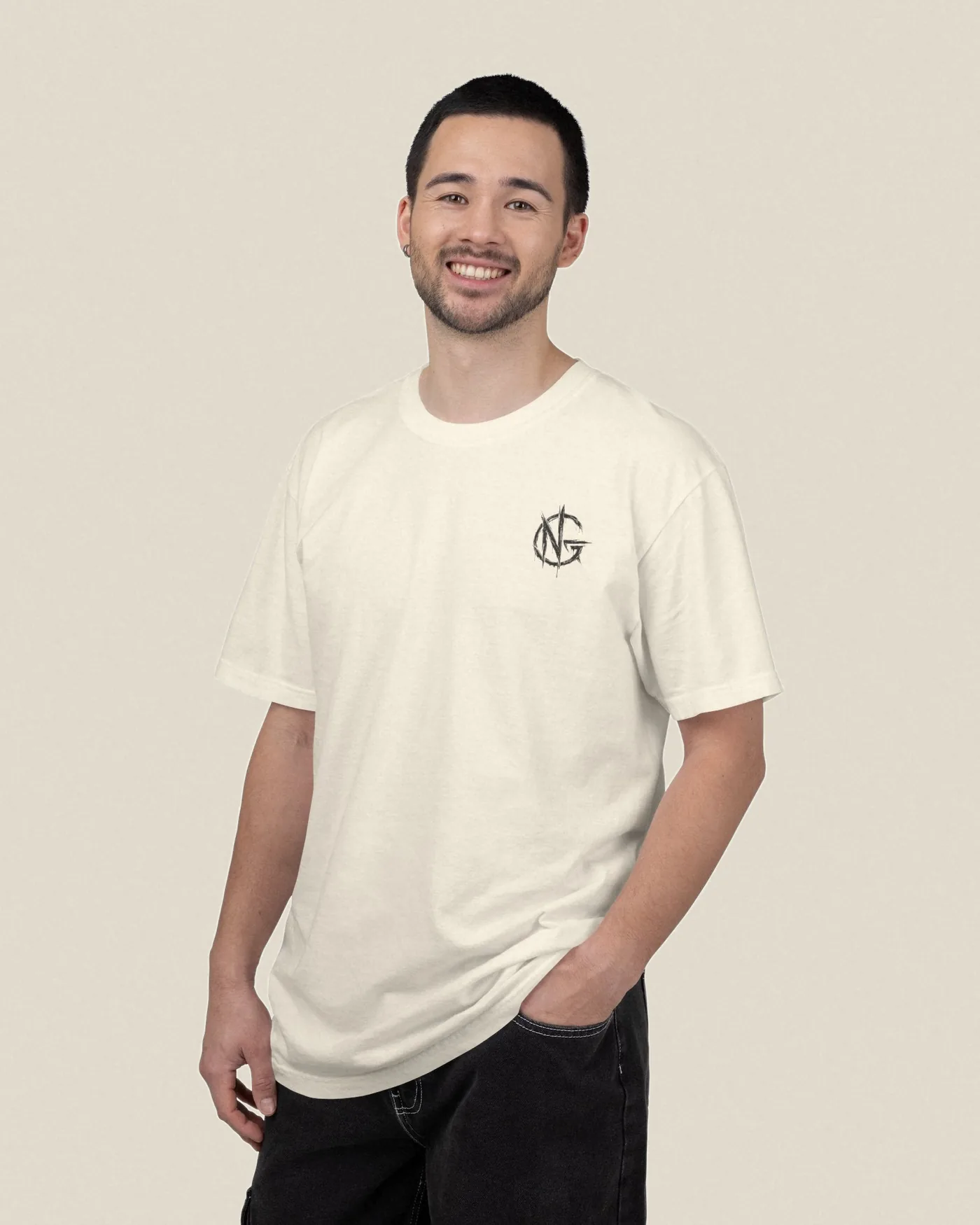 No Guidance Make Your Own Way tee in ivory worn with the NG chest mark visible