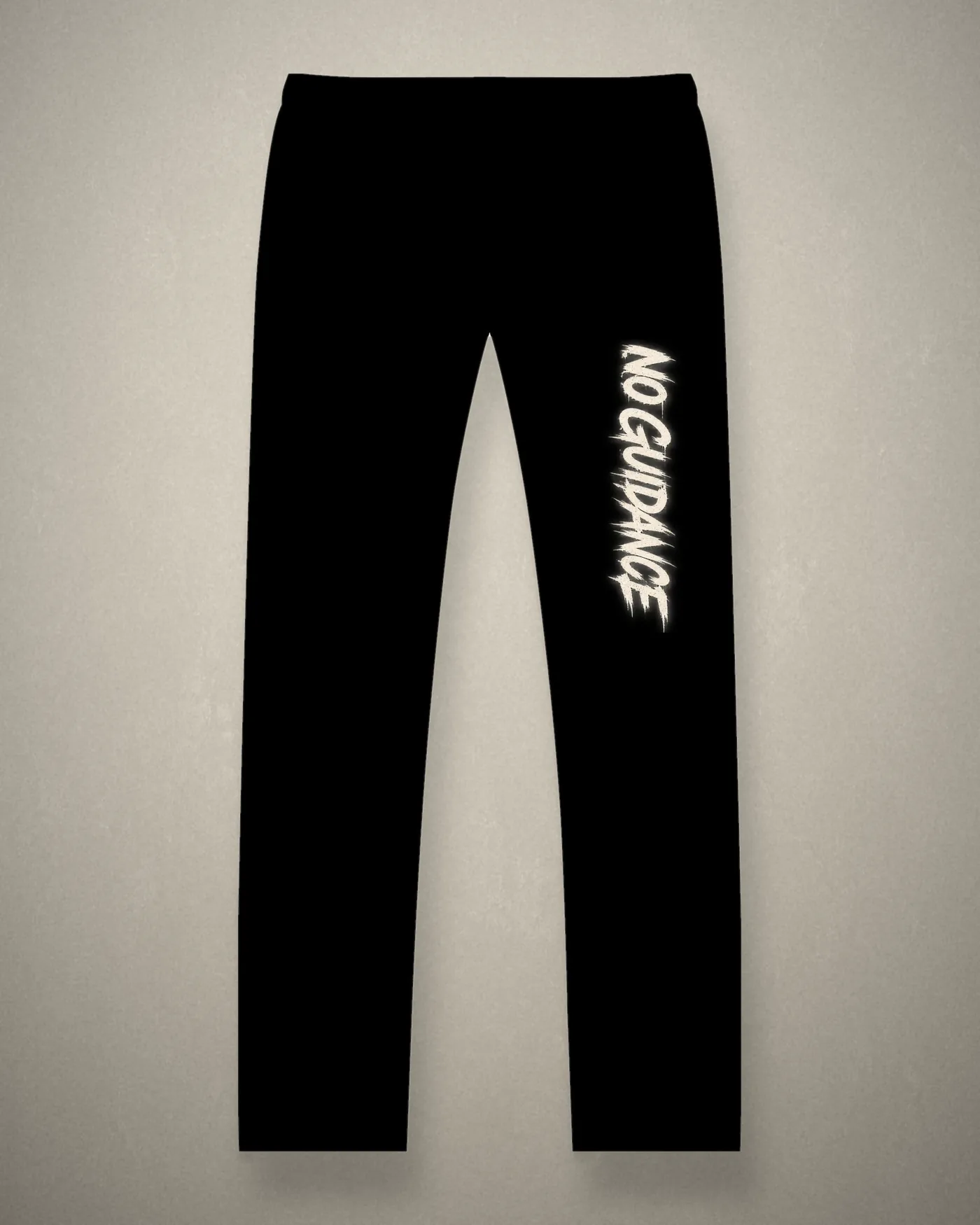 No Guidance joggers in black with the vertical No Guidance print down the leg
