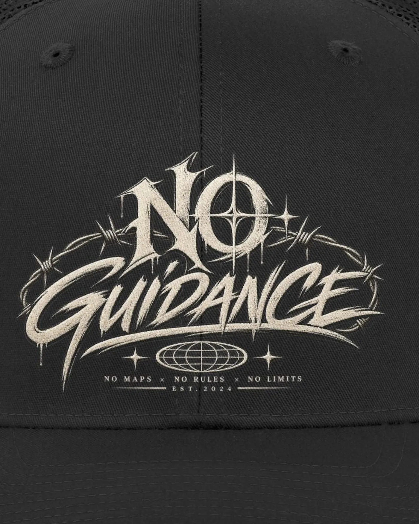 Close view of the distressed No Guidance script embroidered on the cap